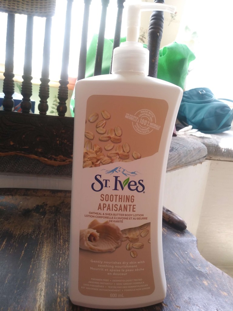 Front of the St. Ives bottle. White bottle with beige design.